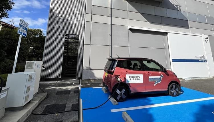 日産と日立、EVからの給電でエレベーターを稼働 「V2X」普及へ共創
